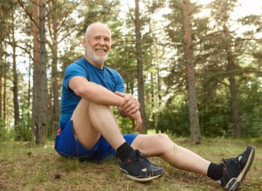 People, nature, sports and leisure concept. Happy carefree retired man with gray stubble sitting comfortably on grass in pine forest, keeping elbow on knee, having rest after cardio exercise outdoor SSUCv3H4sIAAAAAAAAE22NsQ7DIAxE/8UzQ7vyK1EGA26CikCyzVBF/HttKd26ne7e3V2QUGqGeAGVqoMrNoiPALW1KcqodXQzVoCMSocBJE7jQT1/TFlyT2yXMxABAshMLlb44+1WGXoS+w5TL65e2IQsYGqE4h/bbhVFnXI/lpFIdOQ3xKdF51Ql/hlrfQGpHWA3ywAAAA==
